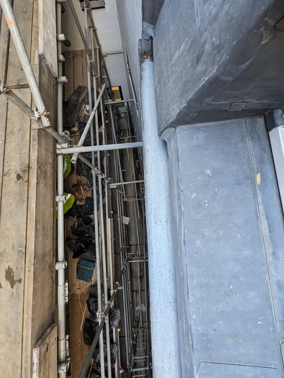 After: the finished lead gutter run, clean and continuous along the cornice