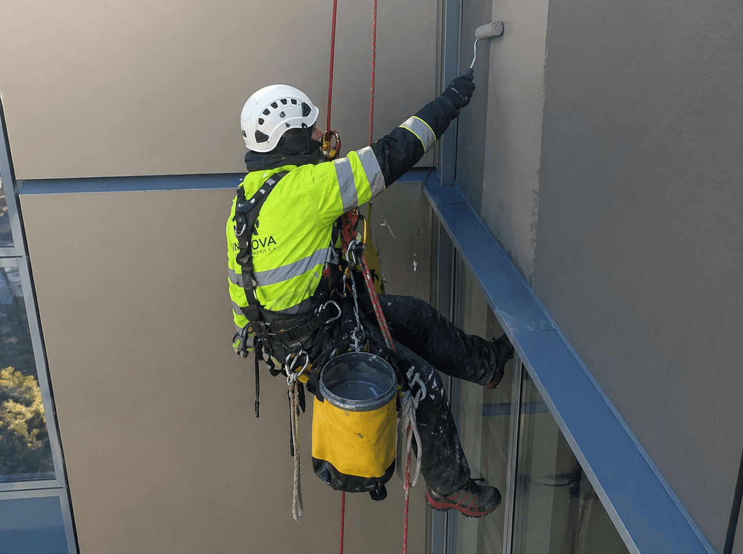 High-level decorating and finishing works carried out by rope access
