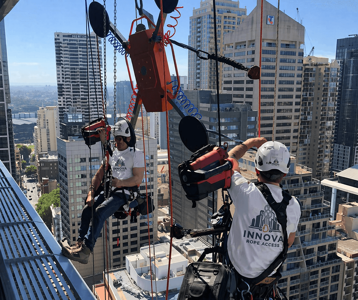 Innova operatives performing facade installation works at height